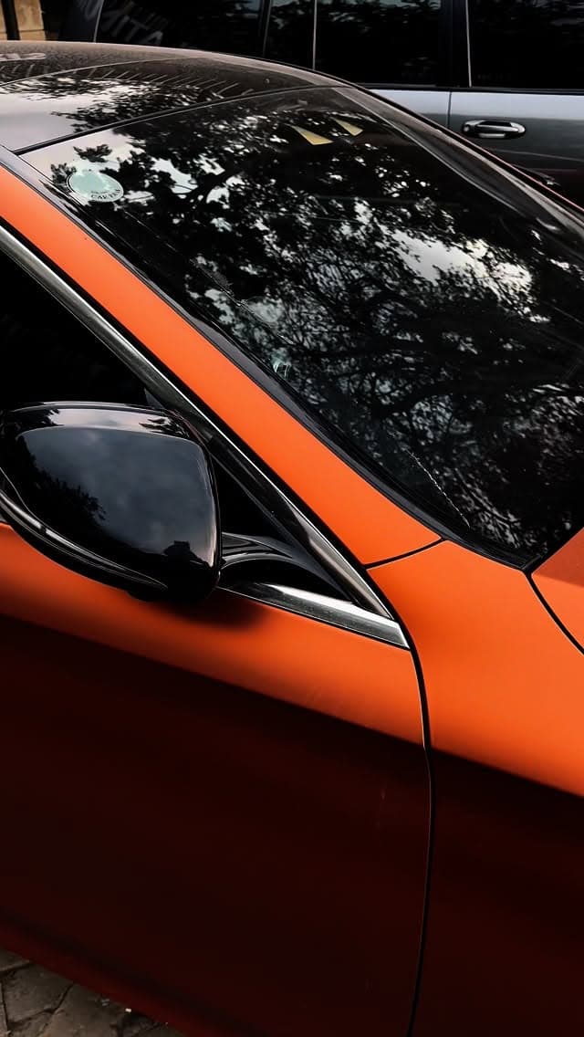 KYRA Customs — matte orange wrap reel
